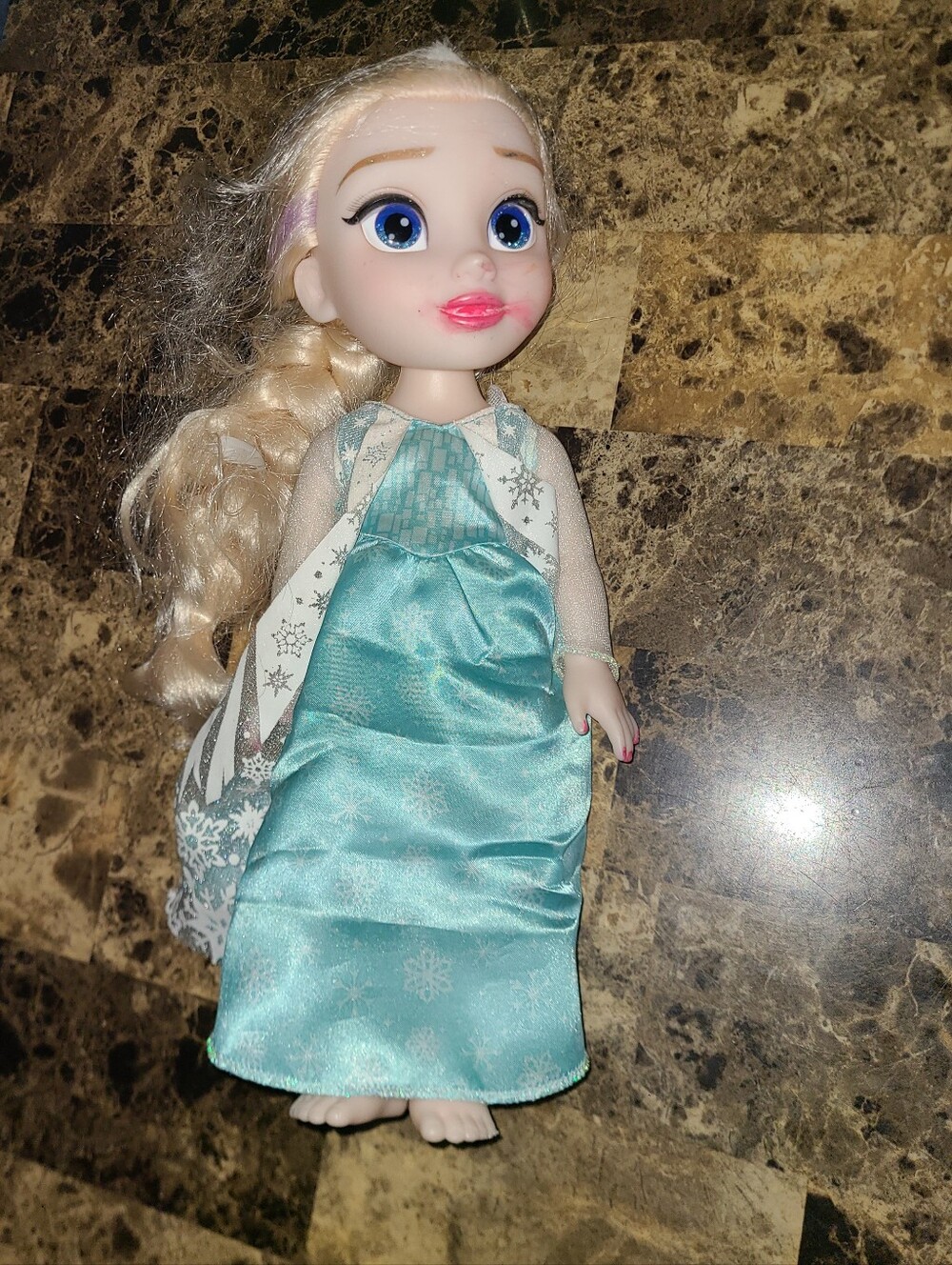 Disney Elsa doll (needs TLC). Has makeup all over face, and nail polish on nails